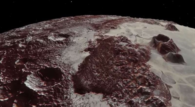 Watch: Flyover Of Pluto’s Majestic Mountains and Icy Plains [Close-Up Video Footage]
