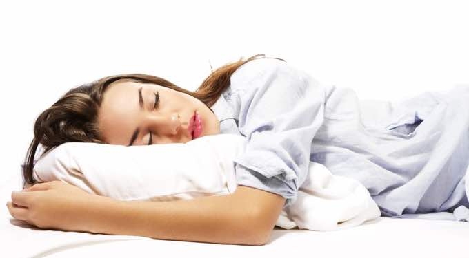 How Sleeping On Your Stomach Affects Your Gut Health