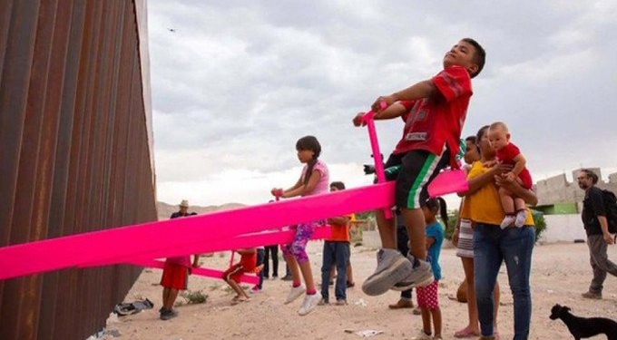 Pink Seesaws Installed at Border Fence, In Joyful Act of Resistance
